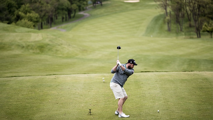 John, an instant before ripping his Pro V1x around...